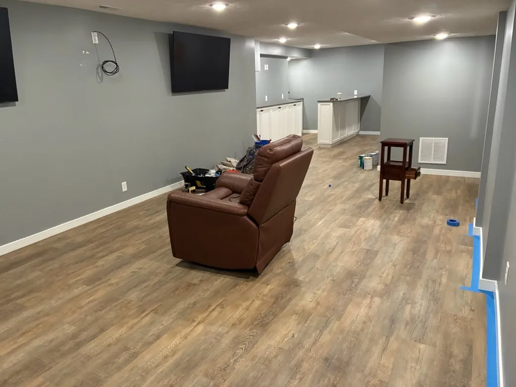 Basement after repaint — fresh gray walls